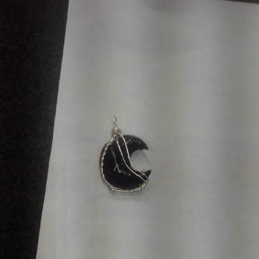 Elegant Black and Silver Crescent Pendant